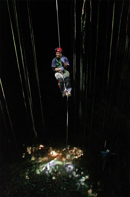 Archaeologist Donny Slater exploring caves