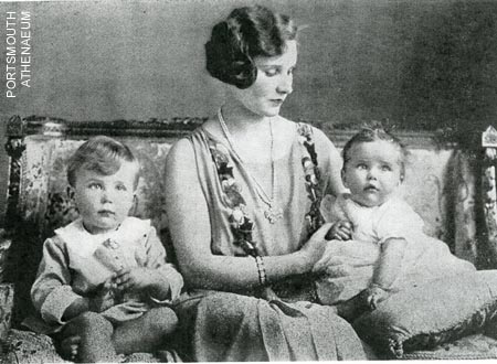  In the mid-1920s, the 6th Countess of Carnarvon is shown with her two children, Henry George Reginald Molyneaux Herbert, who would become the 7th Earl of Carnarvon, and Lady Anne Penelope Marian Herbert. 