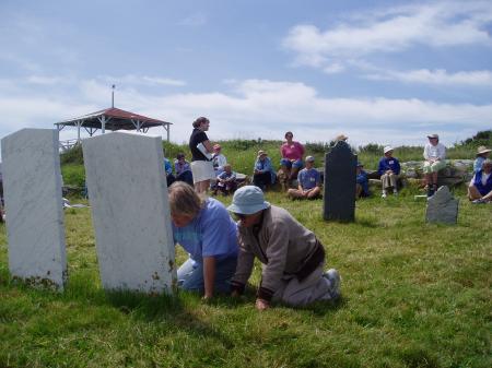 Joy Thurlow Leclair, a Caswell descendent, lectures to amateur historians on Star Island in the Caswell Cemetery / SeacoastNH.com photo