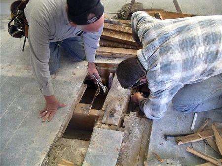 Discovering metal bracket at Gosport House 