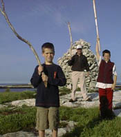 CT boys with sticks at the cairn / SeacoastNH.com